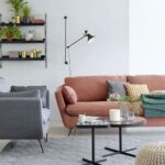 Associer un canapé et un fauteuil pour aménager le salon