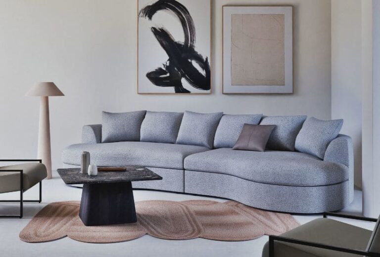 Canapé Seal Maisons du Monde arrondi en 6/7 places gris dans un salon XXL - Touslescanapes