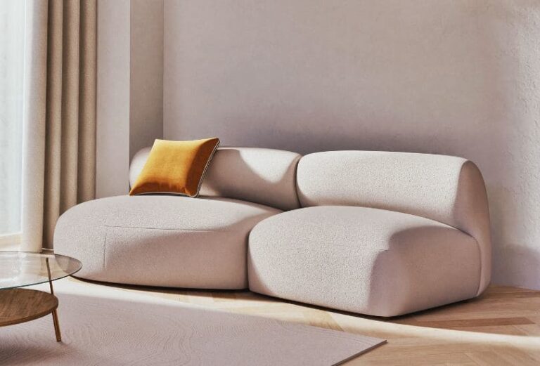 Canapé Stonic Maison du Monde arrondi dans salon lumineux