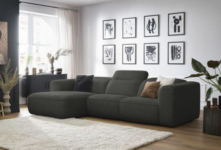 Canapé William Bobochic d'angle gris avec têtières réglables dans grand salon cosy - Touslescanapes