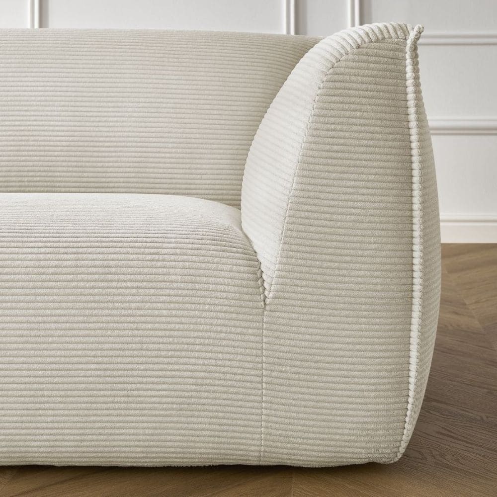 Canapé bas Giorgia de Bobochic avec accoudoir fin avec passepoil