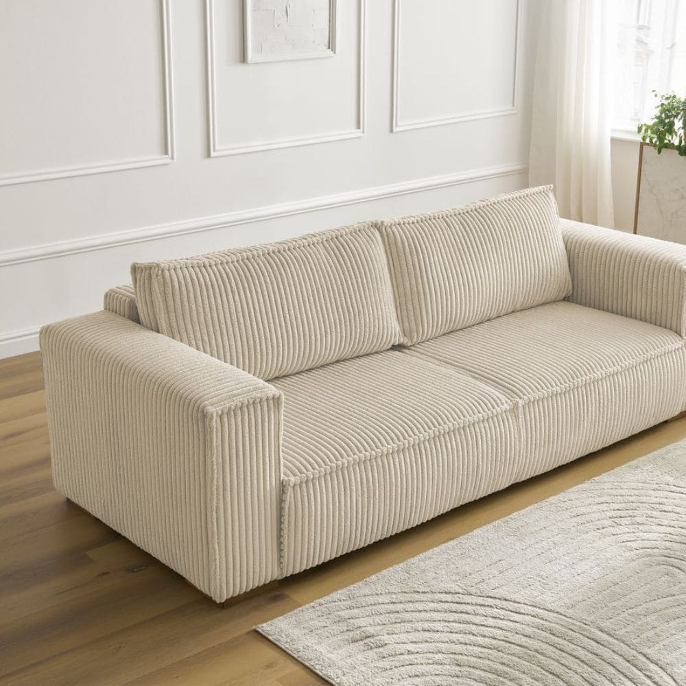 canapé Chelsea Bobochic en velours côtelé dans beau salon tendance avec tapis à poil long