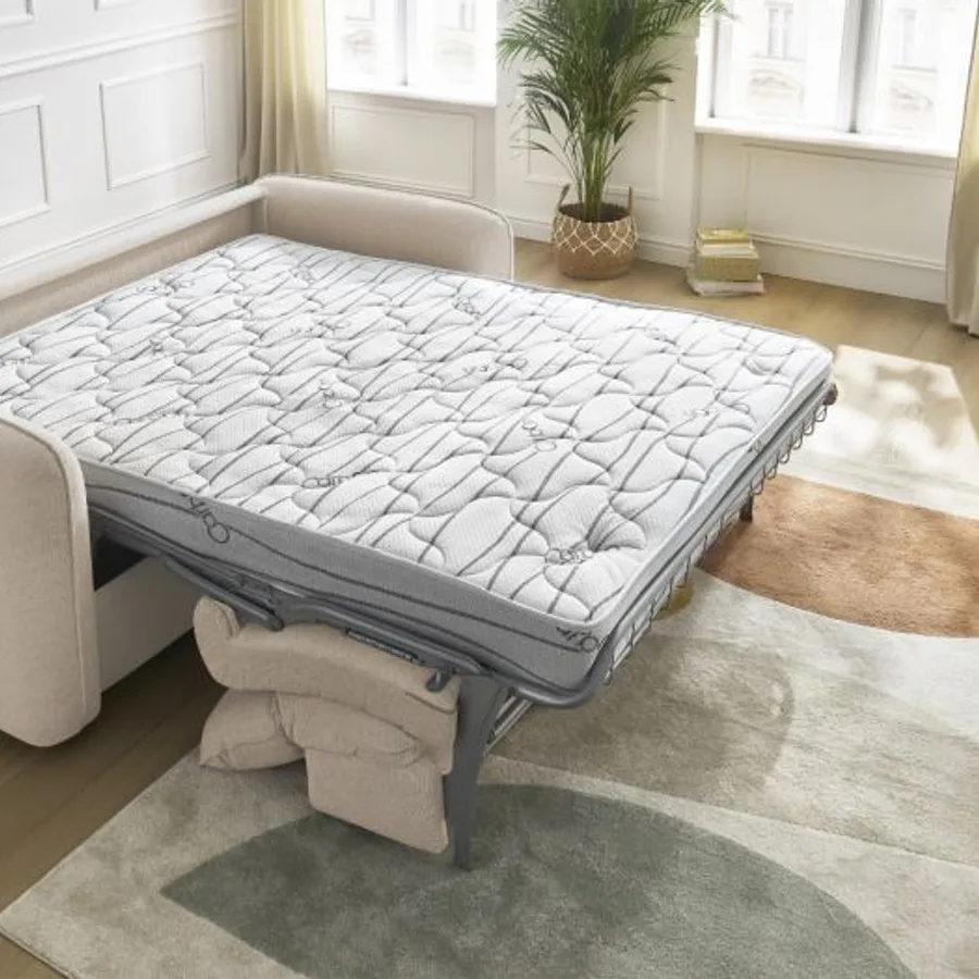 Canapé Achille convertible en lit ouvert avec matelas blanc et coussins rangés dessous.