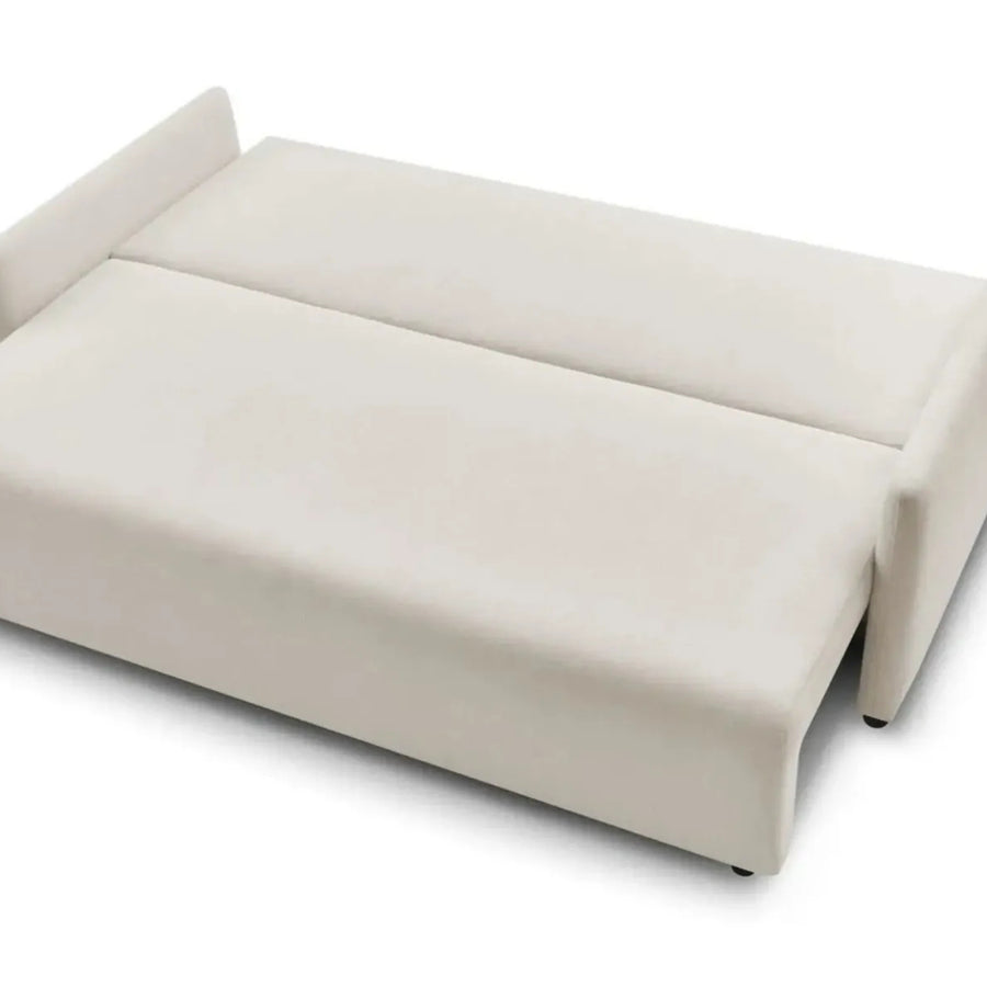 Canapé Axelle beige déplie en lit convertible avec matelas visible.