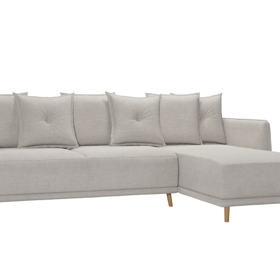 Canapé Bandol d'angle en tissu gris clair vue de face sur fond blanc avec pieds en bois.