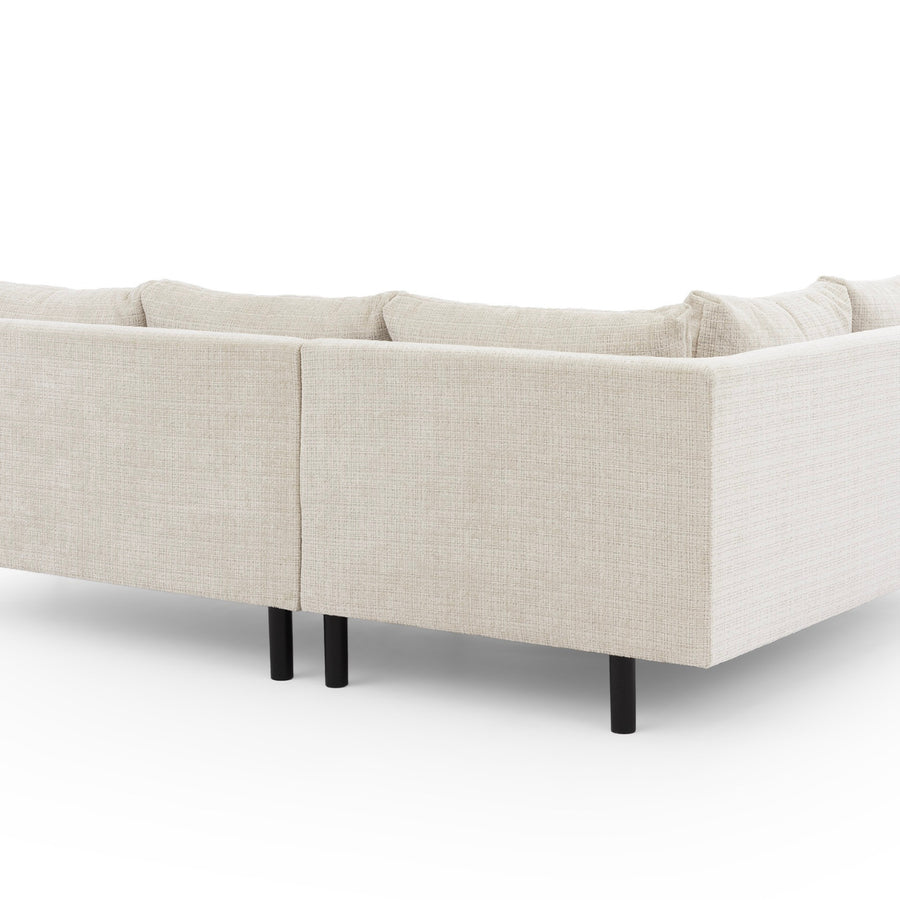 Canapé Bianca d'angle en beige vu de l'arrière montrant son dossier en tissu.