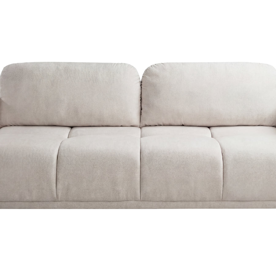 Canapé Dana beige clair vu de profil sur fond blanc, en tissu.