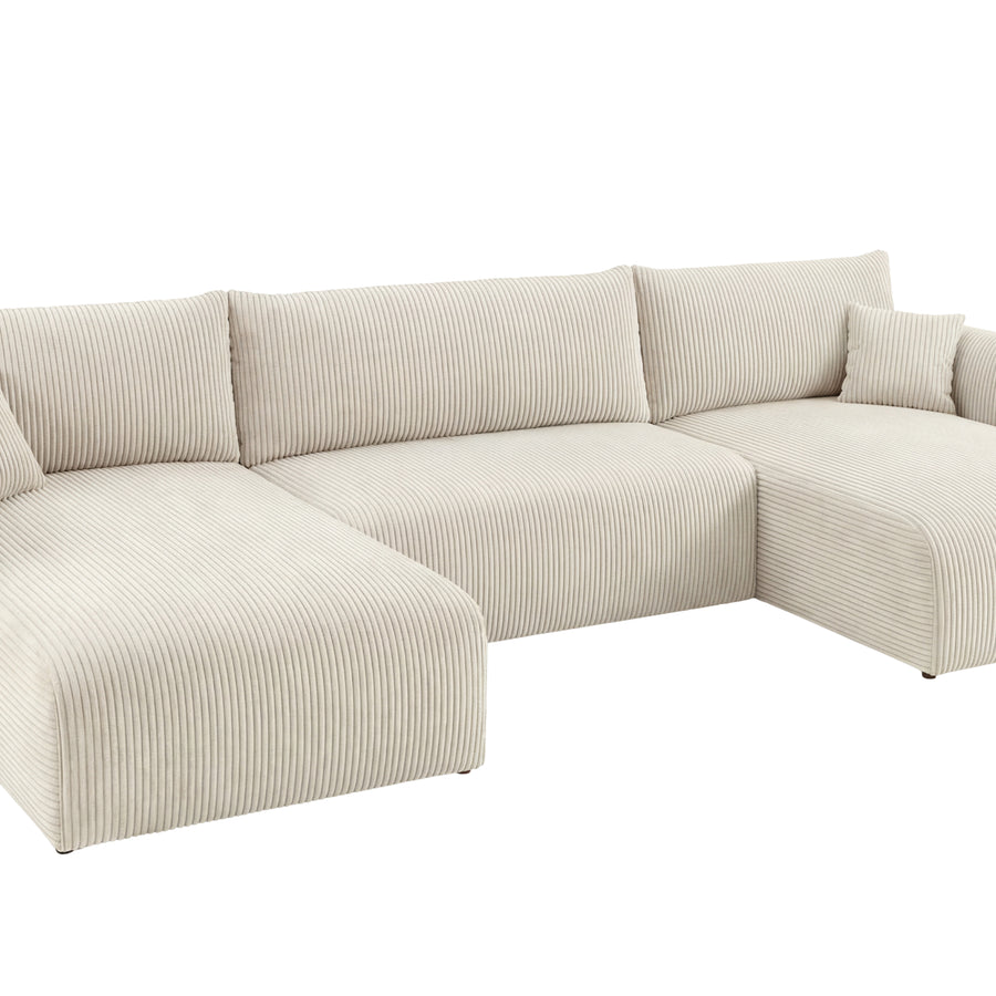 Canapé Elio panoramique angle en tissu beige, vue profil trois quarts montrant profondeur
