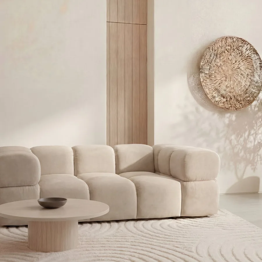 Canapé Gustave angle en beige détouré, vue de face avec tous les modules visibles