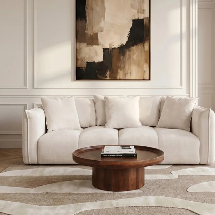 Canapé Harlem beige dans un intérieur moderne blanc et bois naturel.