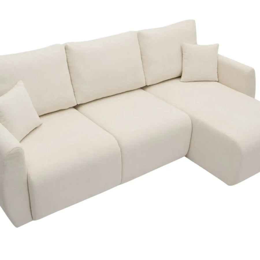 Canapé Hera d'angle en beige avec méridienne, vue d'ensemble de trois quarts.