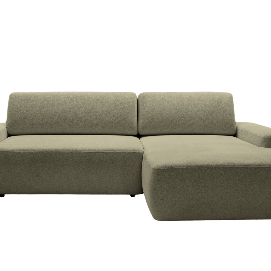 Canapé Ivy d'angle en tissu gris, vue frontale de trois quarts sur fond blanc.