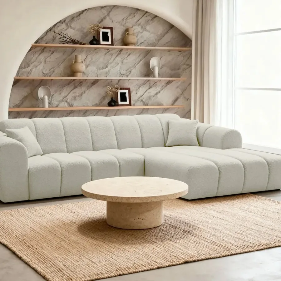 Canapé Laura angle tissu gris clair vue de face dans intérieur blanc lumineux