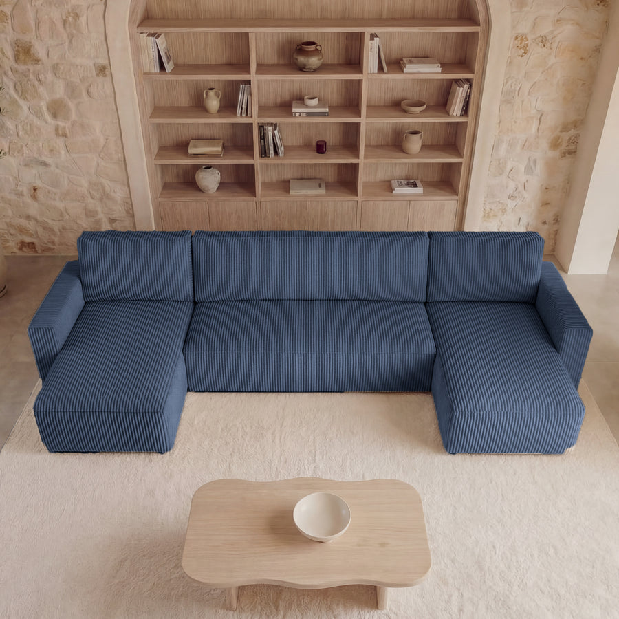 Vue de dessus canapé Maurie bleu panoramique en L avec coffres, assemblage modulable