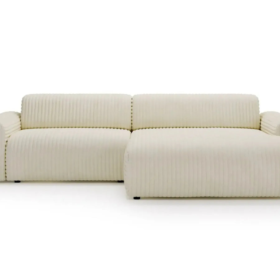 Canapé Mila angle beige vue de trois quarts, profil droit avec éléments modulaires