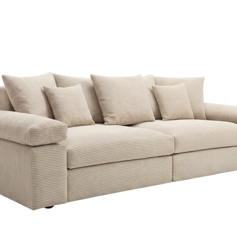 Canapé Octave beige en tissu côtelé vu de profil montrant la profondeur.