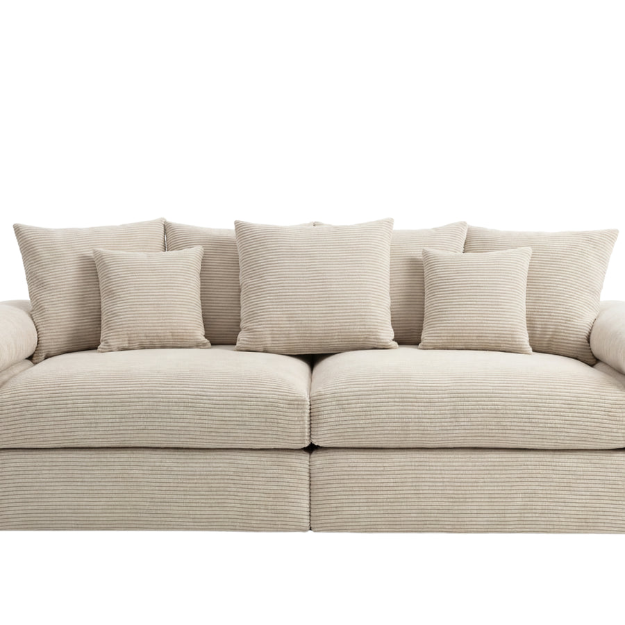 Canapé Octave beige en tissu côtelé vu de face sur fond blanc.