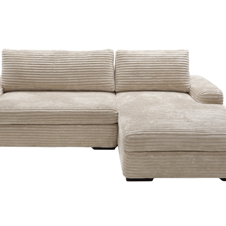 Canapé Odilon angle en tissu beige clair, méridienne à droite, vue de face.