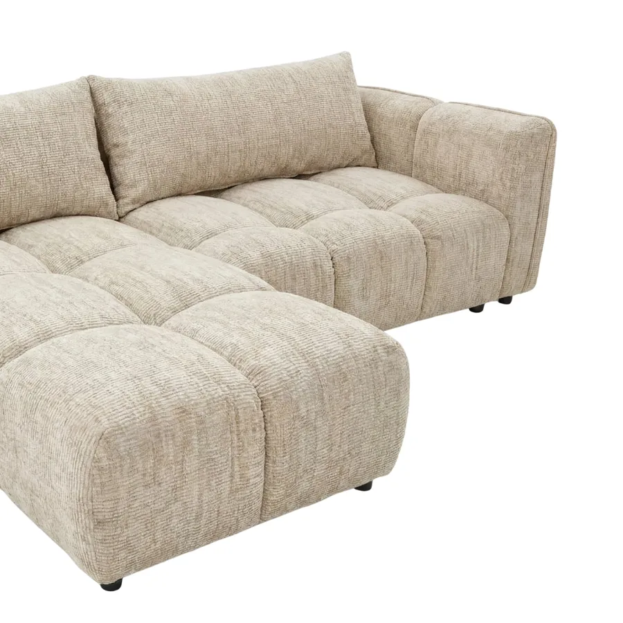 Canapé d'angle Sintra en tissu beige, vue latérale montrant la profondeur et la méridienne.