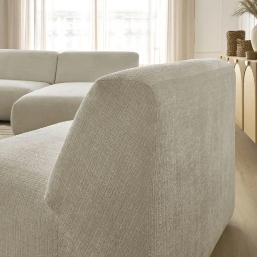 Module de canapé Sirius beige avec accoudoir arrondi, détail du rembourrage épais