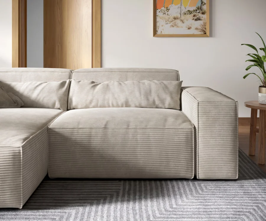 Canapé d'angle Sirpio en velours côtelé beige, vue latérale de profil montrant l'épaisseur et la structure